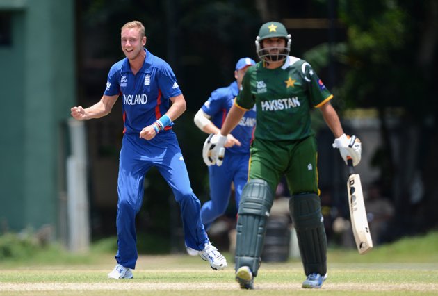 Danny Briggs of England celebrates with Stuart Broad after dismissing Mohammad Hafeez of Pakistan during the ICC T20 World Cup Warm Up Match